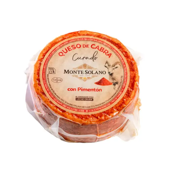 Queso de cabra curado con pimentón Montesolano elaborado con leche cruda de cabra y curación mínima de 60 días